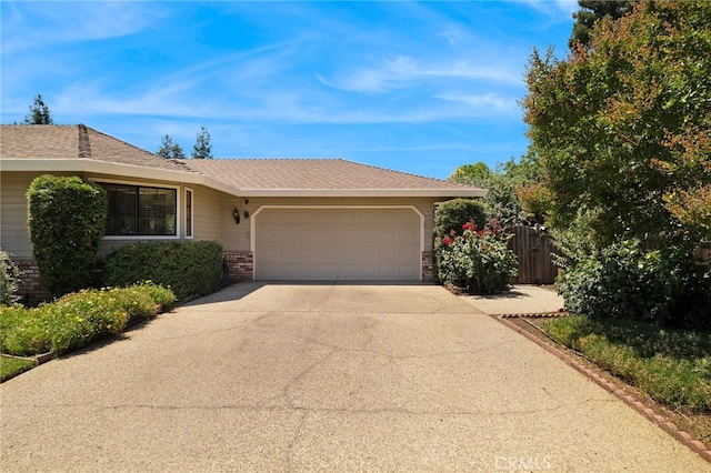 833 Saint Amant Dr, Chico, CA 95926 - single story home with an attached garage, brick siding, and concrete driveway