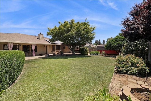 833 Saint Amant Dr, Chico, CA 95926 - fenced backyard featuring a patio
