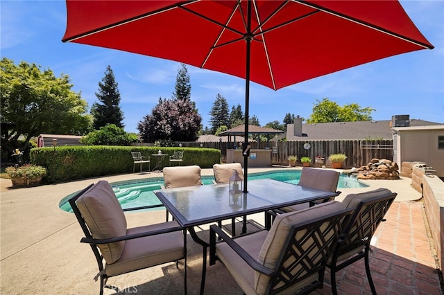 833 Saint Amant Dr, Chico, CA 95926 - fenced backyard with outdoor dining area and a patio area