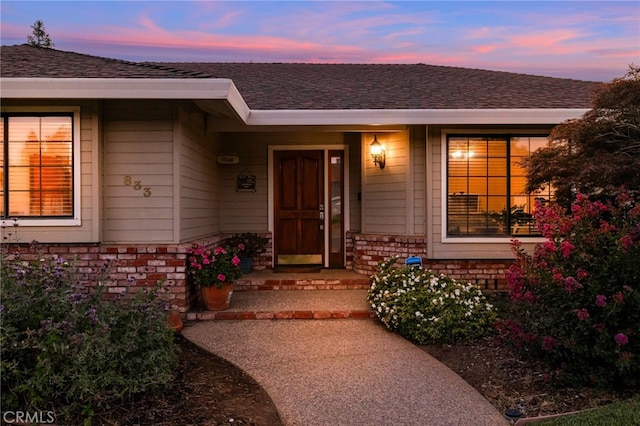 833 Saint Amant Dr, Chico, CA 95926 - property entrance featuring a shingled roof and a porch