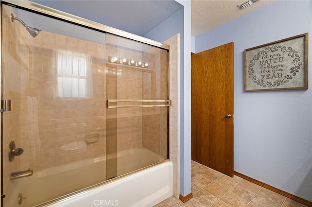 833 Saint Amant Dr, Chico, CA 95926 - full bathroom featuring combined bath / shower with glass door and baseboards