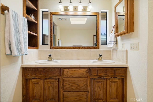 833 Saint Amant Dr, Chico, CA 95926 - bathroom featuring decorative backsplash and double vanity