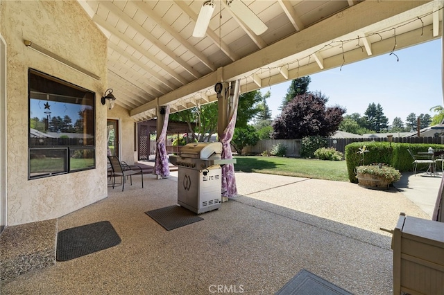 833 Saint Amant Dr, Chico, CA 95926 - fenced backyard with grilling area, a patio, and ceiling fan
