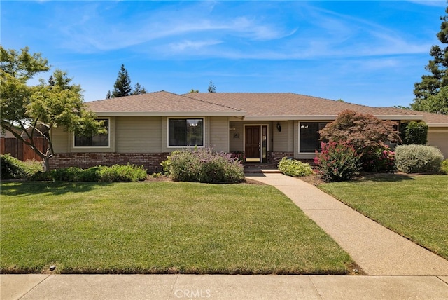 833 Saint Amant Dr, Chico, CA 95926 - ranch-style house featuring a front lawn and brick siding