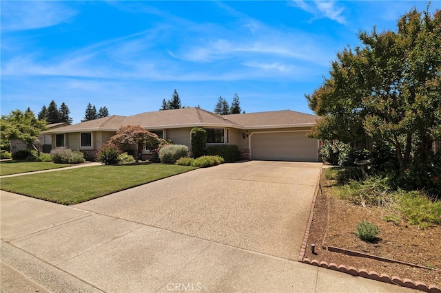833 Saint Amant Dr, Chico, CA 95926 - single story home with a garage, driveway, and a front lawn