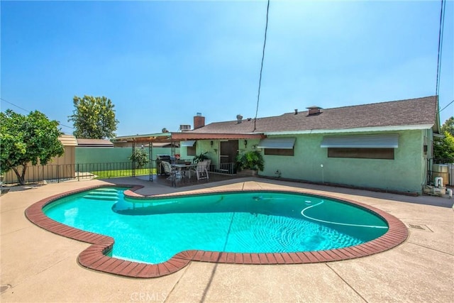 3071 Belle St, San Bernardino, CA 92404 - view of swimming pool featuring a patio