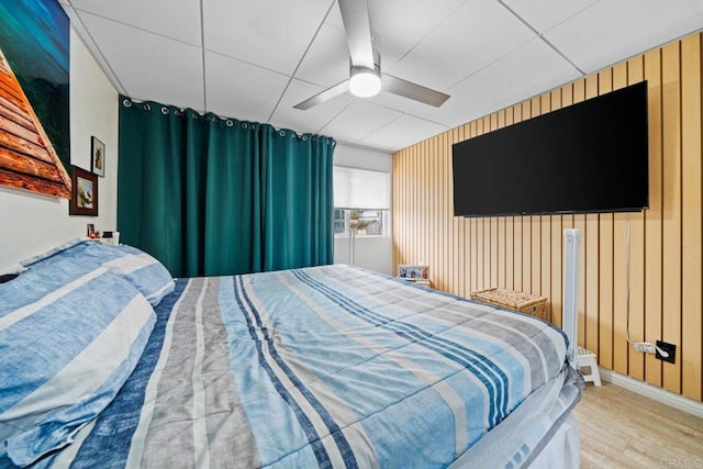 1845 Bayview Heights Dr Unit 110, San Diego, CA 92105 - bedroom with wood finished floors and a ceiling fan
