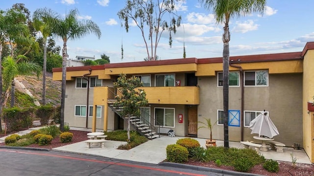 1845 Bayview Heights Dr Unit 110, San Diego, CA 92105 - view of building exterior featuring stairs
