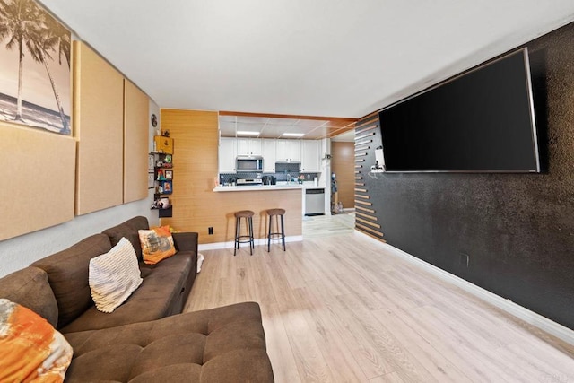 1845 Bayview Heights Dr Unit 110, San Diego, CA 92105 - living area featuring light wood-style flooring