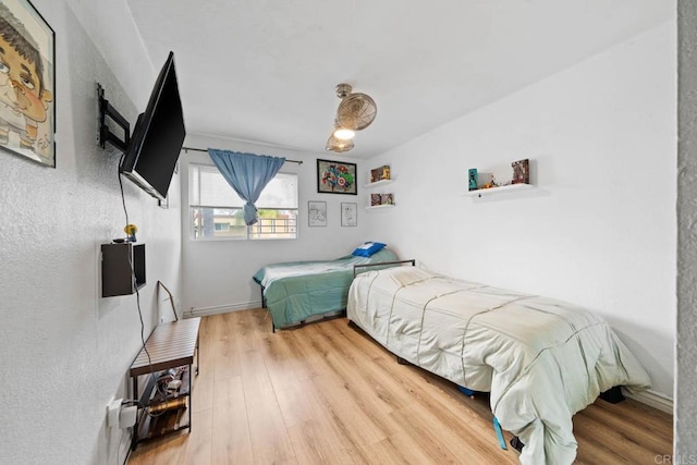 1845 Bayview Heights Dr Unit 110, San Diego, CA 92105 - bedroom with wood finished floors