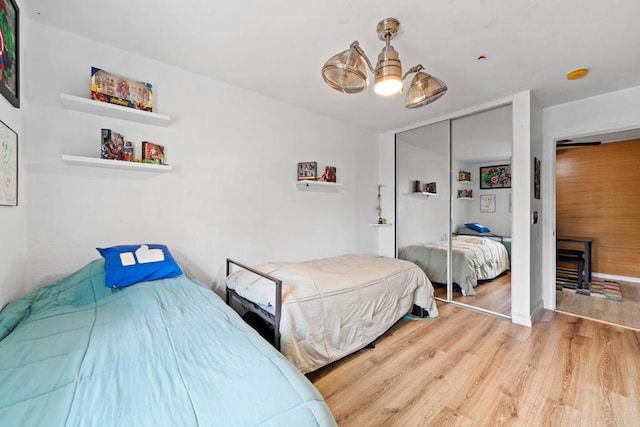 1845 Bayview Heights Dr Unit 110, San Diego, CA 92105 - bedroom with wood finished floors and a closet