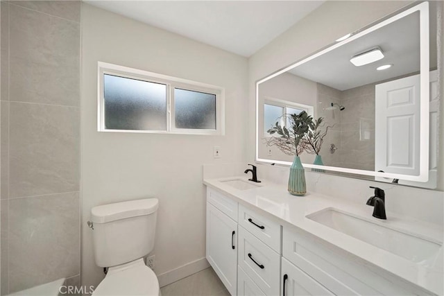 2250 Dorris Pl, Los Angeles, CA 90031 - bathroom featuring double vanity, a tile shower, and toilet