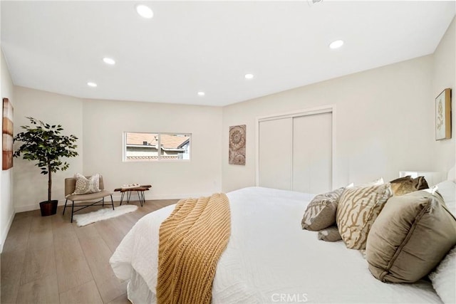 2250 Dorris Pl, Los Angeles, CA 90031 - bedroom with wood finished floors, recessed lighting, a closet, and baseboards
