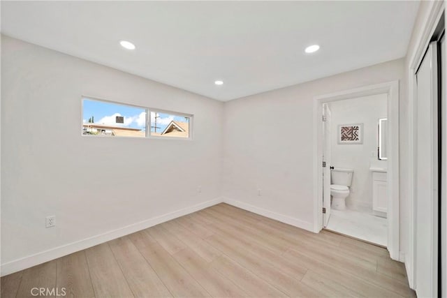 2250 Dorris Pl, Los Angeles, CA 90031 - unfurnished bedroom featuring light wood-type flooring, baseboards, ensuite bathroom, recessed lighting, and a closet