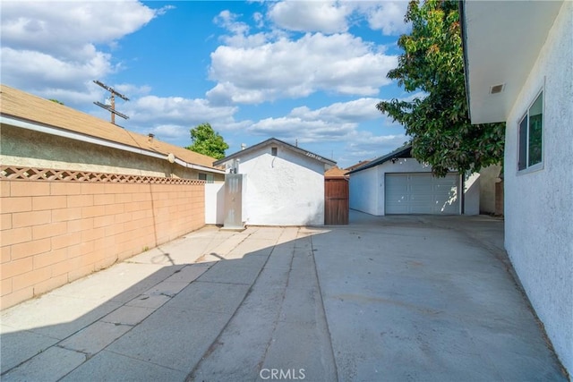 2250 Dorris Pl, Los Angeles, CA 90031 - fenced backyard featuring an outbuilding and a gate