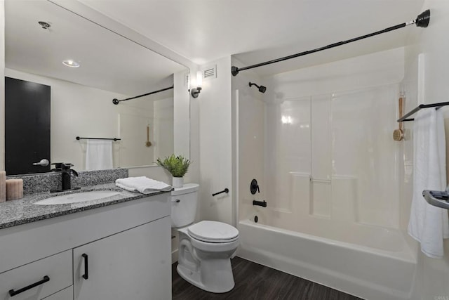 425 W Beech St Unit 227, San Diego, CA 92101 - full bathroom featuring wood finished floors, vanity, and washtub / shower combination
