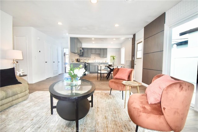 8151 Orangewood Ave, Stanton, CA 90680 - living room featuring light wood-type flooring, baseboards, and recessed lighting