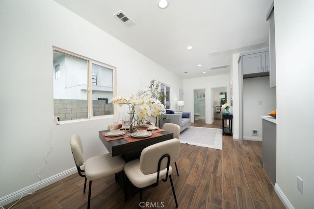 8151 Orangewood Ave, Stanton, CA 90680 - dining space featuring dark wood-style floors, recessed lighting, and baseboards