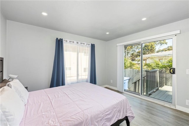 134 Palm Ave, National City, CA 91950 - bedroom featuring access to outside, baseboards, wood finished floors, and recessed lighting