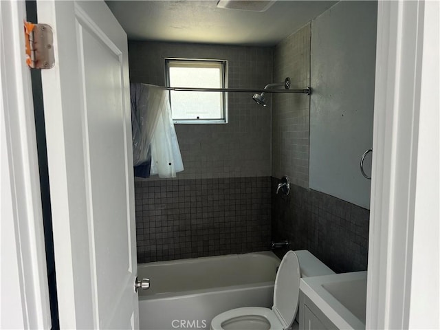 134 Palm Ave, National City, CA 91950 - full bathroom featuring toilet, shower / washtub combination, and vanity