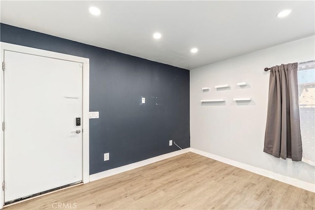134 Palm Ave, National City, CA 91950 - unfurnished room with wood finished floors, recessed lighting, and baseboards