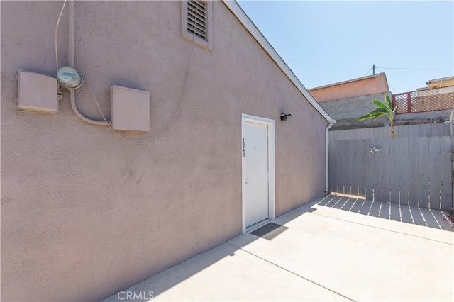 134 Palm Ave, National City, CA 91950 - entrance to property featuring a patio area and stucco siding