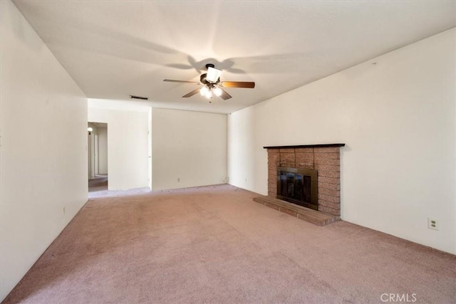 4038 Dartmouth Ln, Santa Maria, CA 93455 - unfurnished living room featuring ceiling fan, light colored carpet, and a brick fireplace