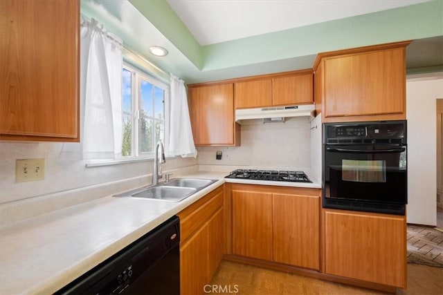 4038 Dartmouth Ln, Santa Maria, CA 93455 - kitchen featuring black appliances, under cabinet range hood, a sink, light countertops, and lofted ceiling