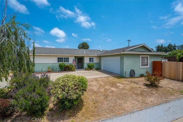 4038 Dartmouth Ln, Santa Maria, CA 93455 - ranch-style home with an attached garage, concrete driveway, and stucco siding