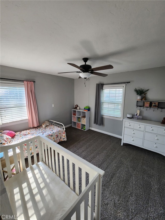 34939 Date Ave, Yucaipa, CA 92399 - bedroom featuring dark carpet and a ceiling fan
