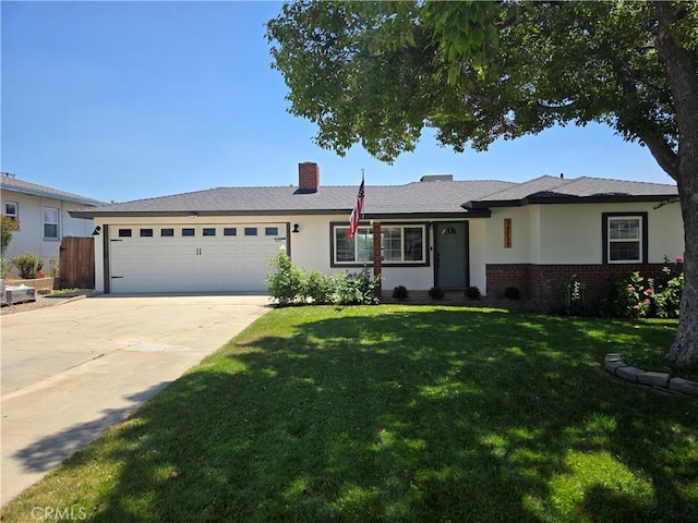 34939 Date Ave, Yucaipa, CA 92399 - ranch-style house with a garage, concrete driveway, a front lawn, brick siding, and stucco siding