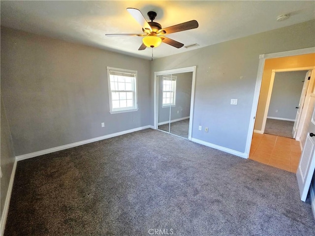 34939 Date Ave, Yucaipa, CA 92399 - unfurnished bedroom featuring carpet floors, a closet, and ceiling fan