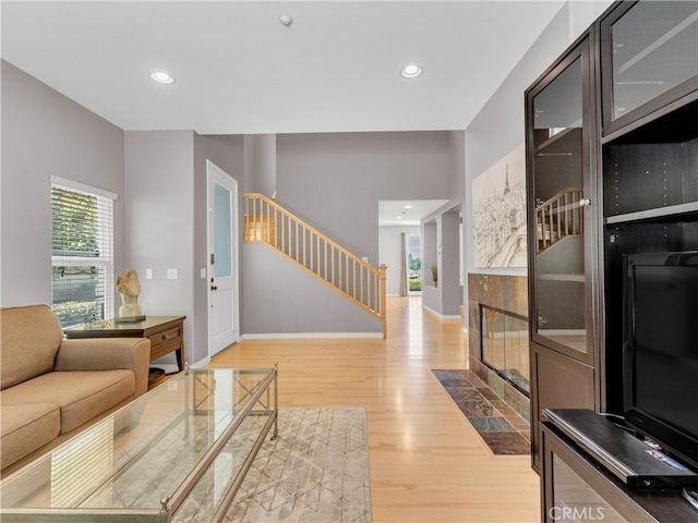 5637 Como Cir, Woodland Hills, CA 91367 - living room with stairs, wood finished floors, and recessed lighting