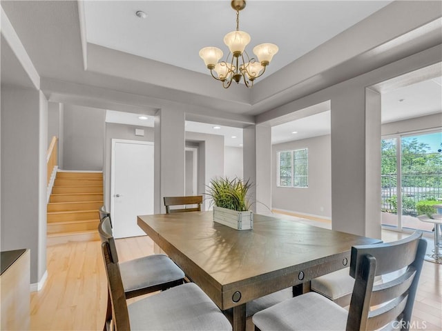 5637 Como Cir, Woodland Hills, CA 91367 - dining area with a chandelier, healthy amount of natural light, light wood finished floors, stairs, and recessed lighting