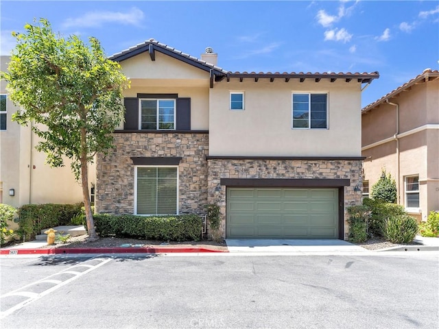 5637 Como Cir, Woodland Hills, CA 91367 - view of front of property featuring stucco siding, stone siding, a garage, and a tile roof