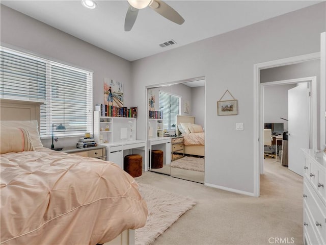 5637 Como Cir, Woodland Hills, CA 91367 - bedroom with light colored carpet, a closet, a desk, and ceiling fan