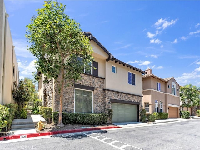 5637 Como Cir, Woodland Hills, CA 91367 - view of front facade with stone siding, an attached garage, stucco siding, a chimney, and a tile roof