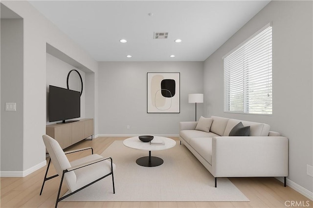 5637 Como Cir, Woodland Hills, CA 91367 - living room featuring light wood finished floors and recessed lighting