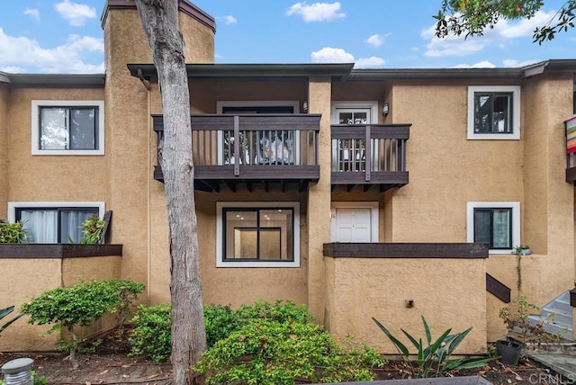 1680 N Coast Highway 101 Unit 36, Encinitas, CA 92024 - back of property with a balcony and stucco siding