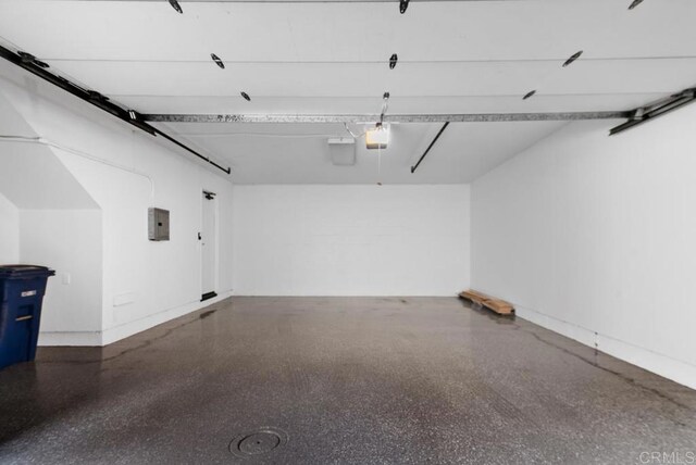 1680 N Coast Highway 101 Unit 36, Encinitas, CA 92024 - garage featuring electric panel and a garage door opener