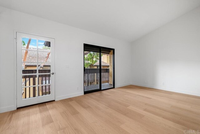 1680 N Coast Highway 101 Unit 36, Encinitas, CA 92024 - empty room featuring light wood-style floors and healthy amount of natural light