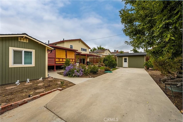 2902 E Trenton E, Orange, CA 92867 - view of front of house with an outdoor structure and concrete driveway