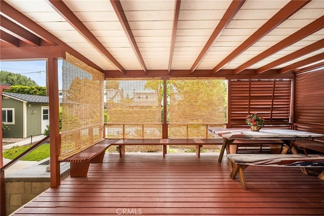 2902 E Trenton E, Orange, CA 92867 - unfurnished sunroom with beamed ceiling and outdoor dining space