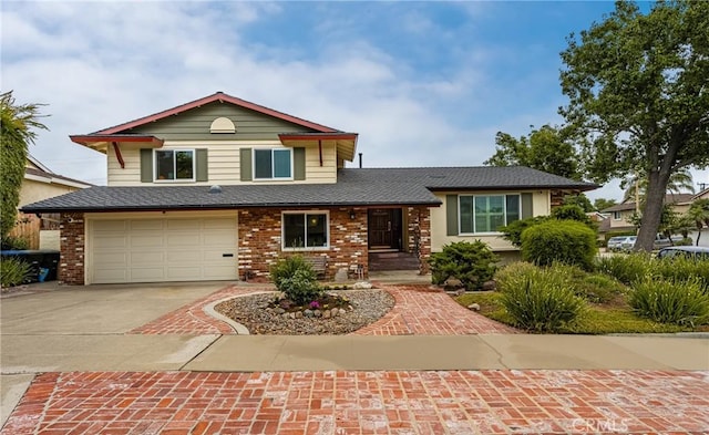 2902 E Trenton E, Orange, CA 92867 - view of front of home with concrete driveway, an attached garage, brick siding, and a shingled roof