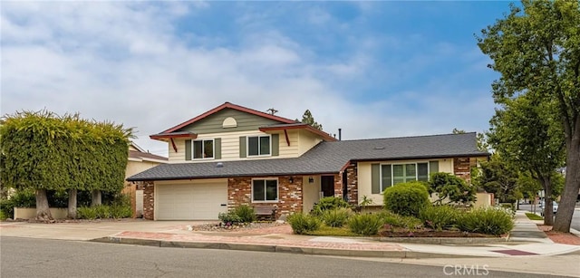 2902 E Trenton E, Orange, CA 92867 - view of front facade with an attached garage, concrete driveway, and brick siding