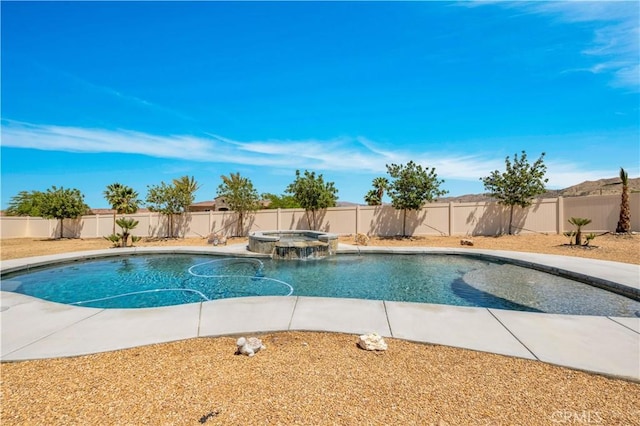 7988 Borrego Ct, Yucca Valley, CA 92284 - view of swimming pool with a fenced backyard and a pool with connected hot tub