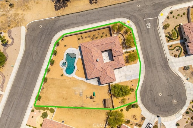 7988 Borrego Ct, Yucca Valley, CA 92284 - aerial view of property's location with property parcel outlined and a pool