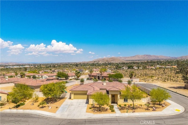 7988 Borrego Ct, Yucca Valley, CA 92284 - aerial perspective of suburban area with a mountain backdrop