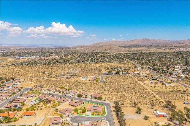 7988 Borrego Ct, Yucca Valley, CA 92284 - aerial view of property and surrounding area with a mountainous background and a desert landscape