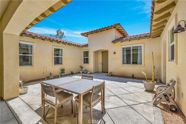 7988 Borrego Ct, Yucca Valley, CA 92284 - view of patio / terrace with outdoor dining area